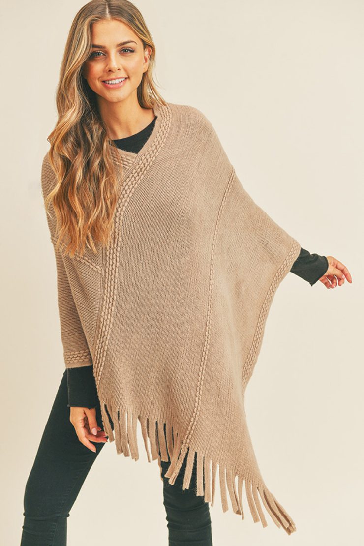 A photo of the Embossed Dotted Line Poncho In Taupe product