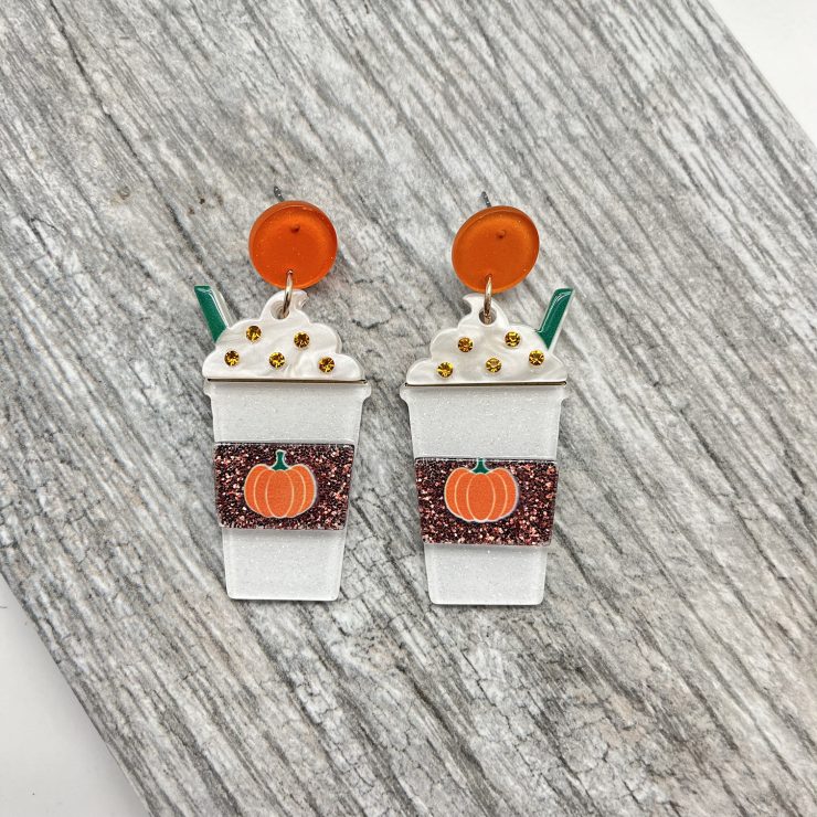 A photo of the Pumpkin Spice Earrings In White product