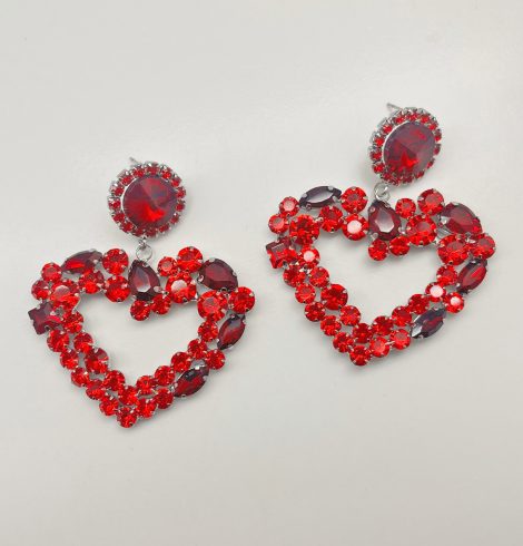 A photo of the Crystal Heart Earrings In Red product