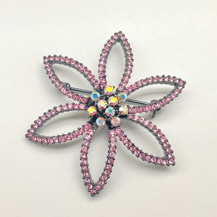 A photo of the Flora Rhinestone Pin In Pink product