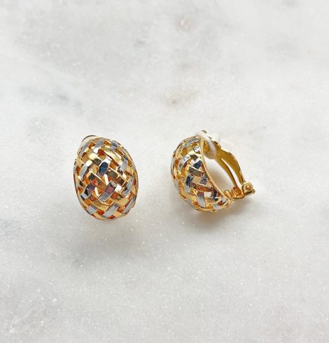 A photo of the Two Tone Woven Clip Earrings product