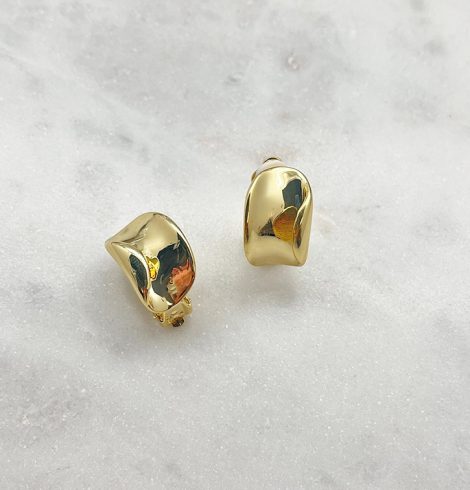 A photo of the Gold Wave Clip Earrings product