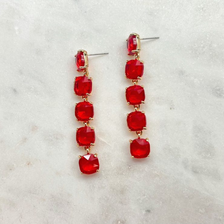 A photo of the A Little Sparkle Earrings In Red product