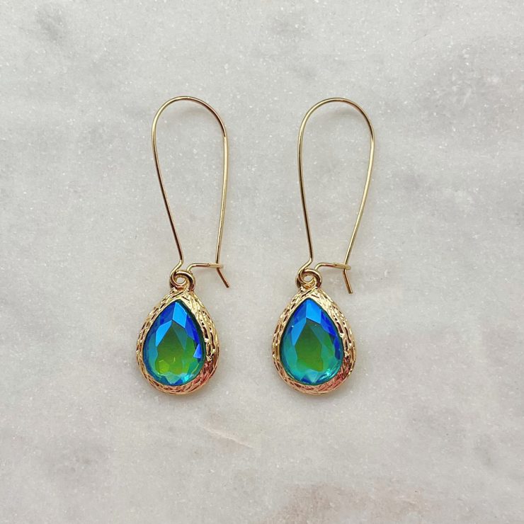 A photo of the Simple Jewel Earrings In Blue Green product