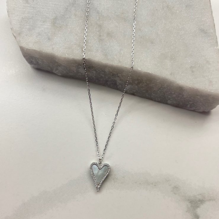 A photo of the Mother Of Pearl Heart Necklace In Silver product