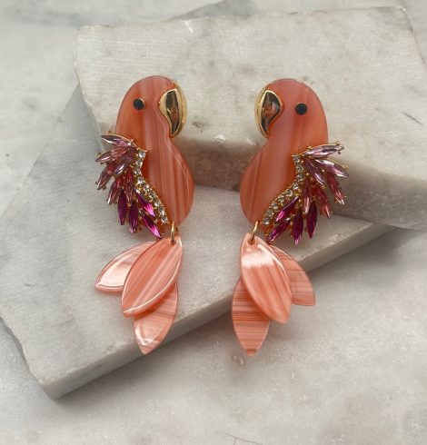 A photo of the Parrot Earrings In Pink product