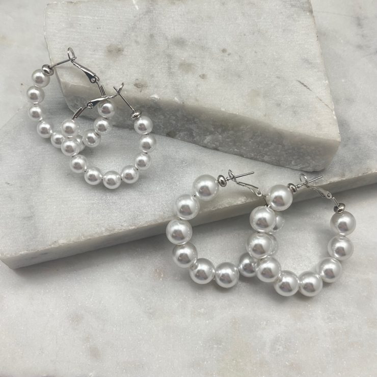 A photo of the Pearl Hoops In Silver product