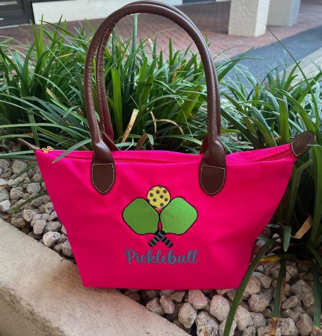 A photo of the Nylon Pickleball Tote In Neon Pink product