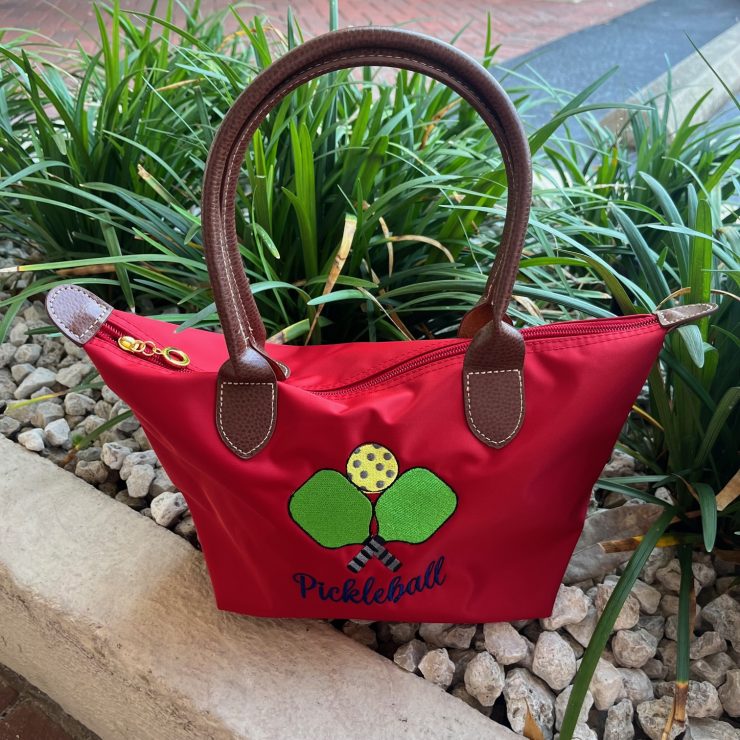 A photo of the Nylon Pickleball Tote In Red product