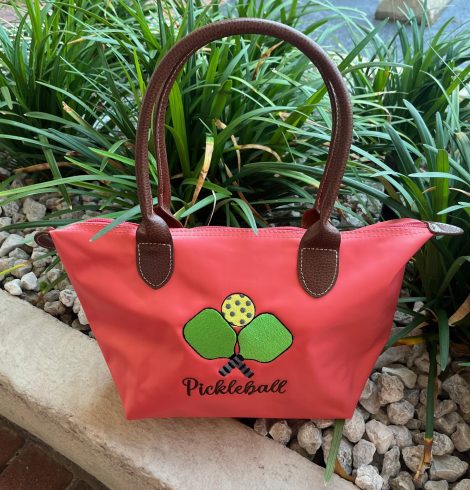 A photo of the Nylon Pickleball Tote In Coral product