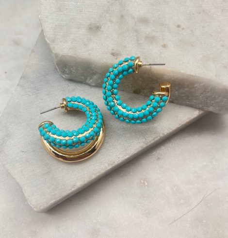 A photo of the Turquoise Double Hoops In Gold product