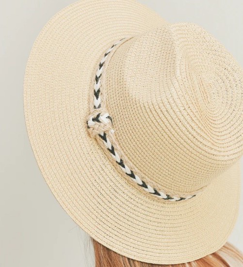A photo of the Black & White Braided Jute Panama Hat In Beige product
