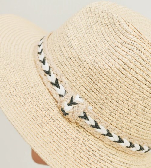 A photo of the Black & White Braided Jute Panama Hat In Beige product