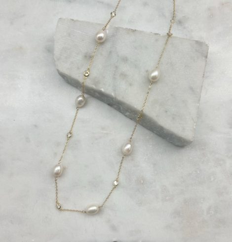 A photo of the Serena Pearl Necklace In Gold product