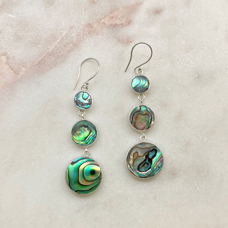 A photo of the Abalone Drop Earrings product