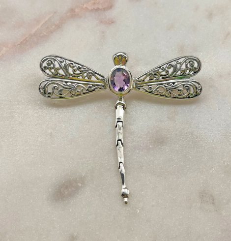 A photo of the Amethyst Cutout Dragonfly Pendant product