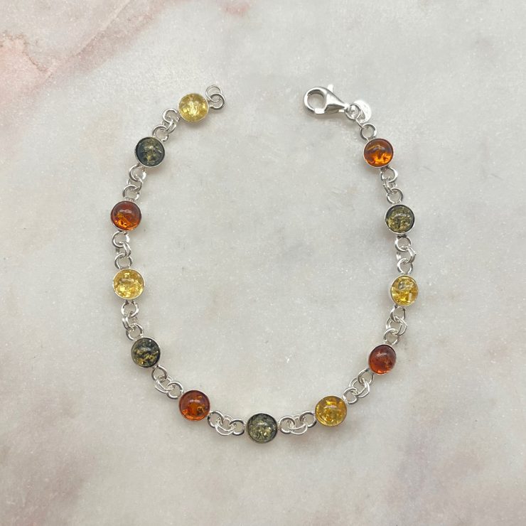 A photo of the Circle Multicolored Amber Link Bracelet product