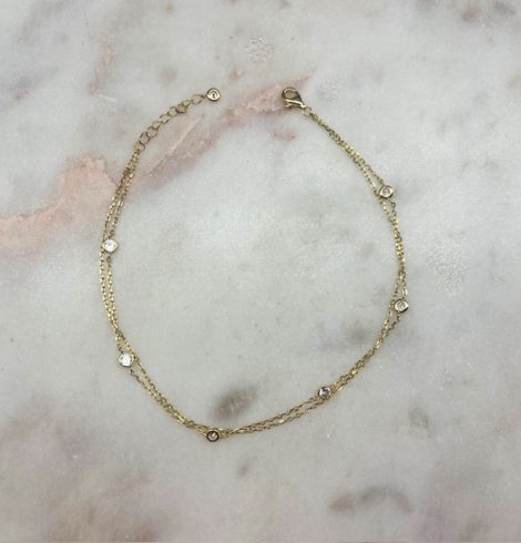 A photo of the Double Layer CZ Bezel Anklet product