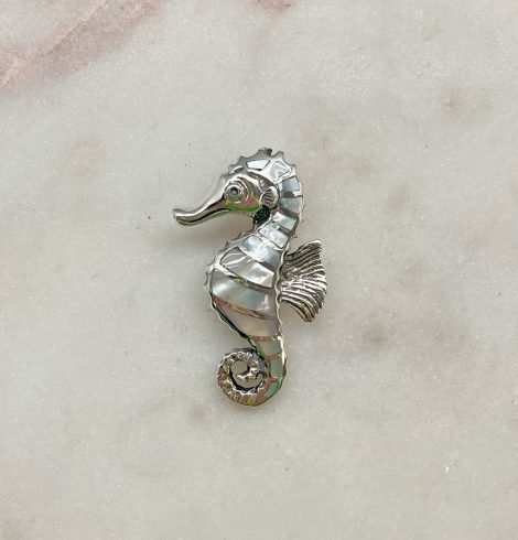 A photo of the Mother of Pearl Seahorse Pendant product