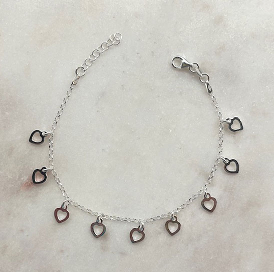 A photo of the Multi Heart Charm Bracelet product