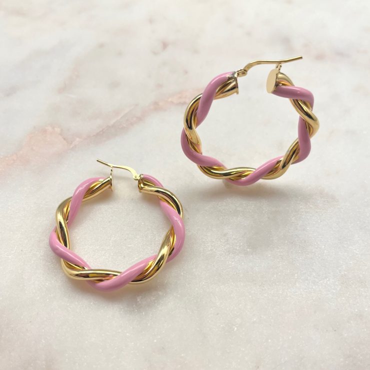 A photo of the Pink & Gold Italian Twist Hoops product