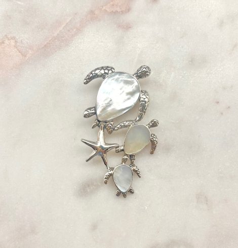 A photo of the Mother of Pearl Sea Turtle Pendant product