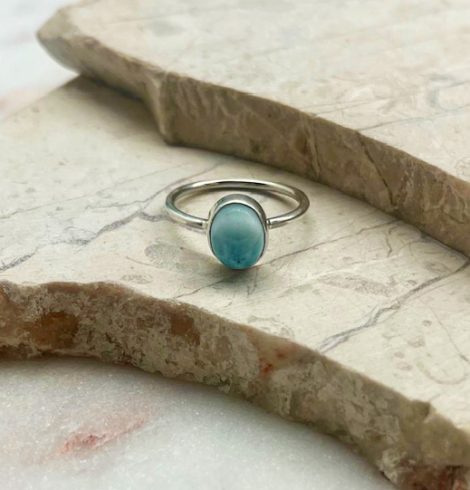 A photo of the Simple Larimar Button Ring product