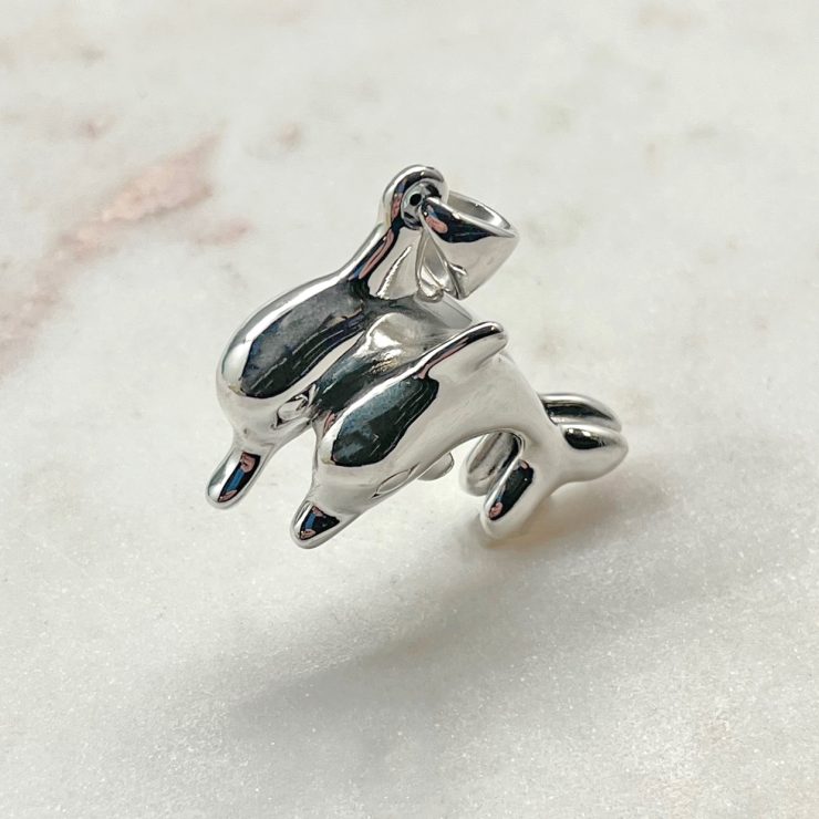 A photo of the Sterling Silver Double Dolphin Puffed Pendant product