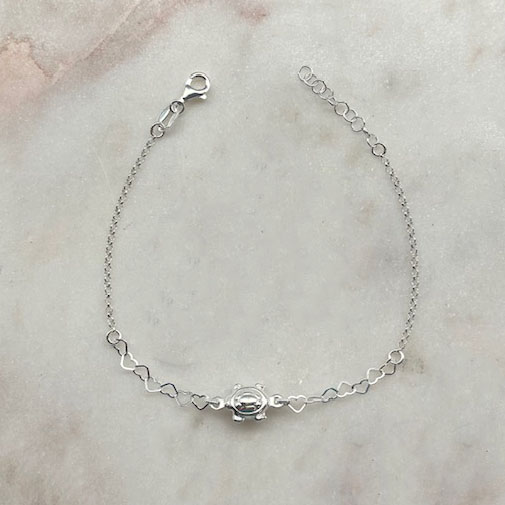 A photo of the Turtle Charm with Heart Link Bracelet product