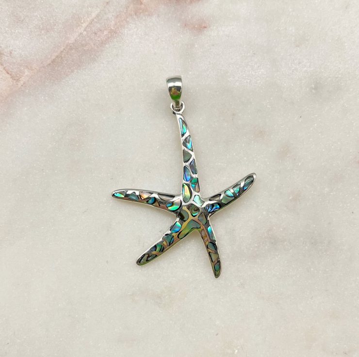 A photo of the Spotted Abalone Starfish Pendant product