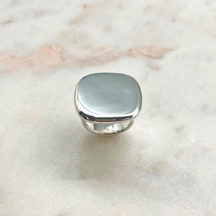 A photo of the Sterling Silver Square Signet Ring product