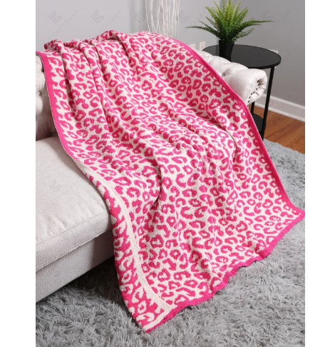 A photo of the Comfy Luxe Leopard Blanket in Hot Pink product