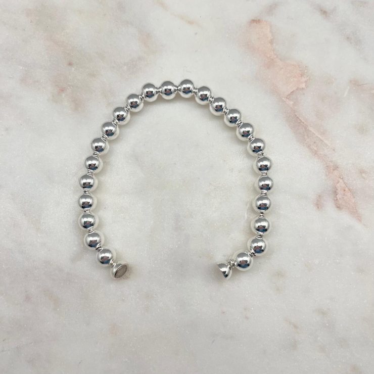 A photo of the 8mm Magnetic Ball Bracelet product