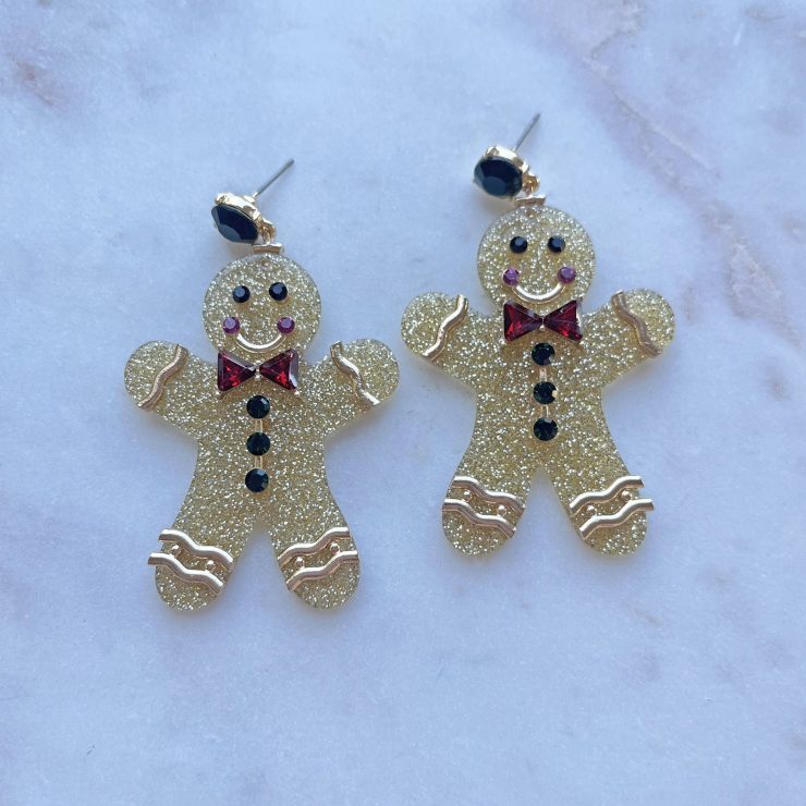 A photo of the Gingerbread Man Earrings product