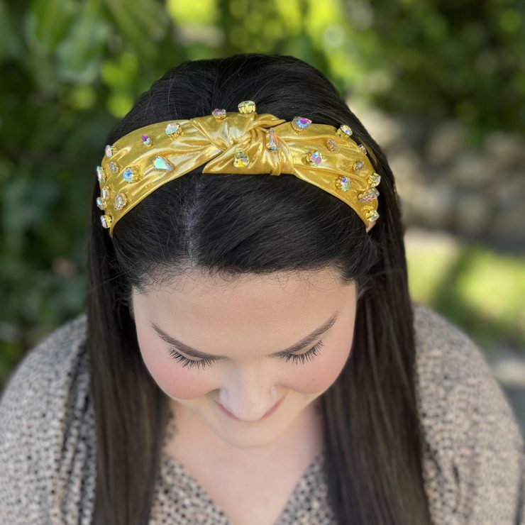 A photo of the Embellished Metallic Gold Headband product