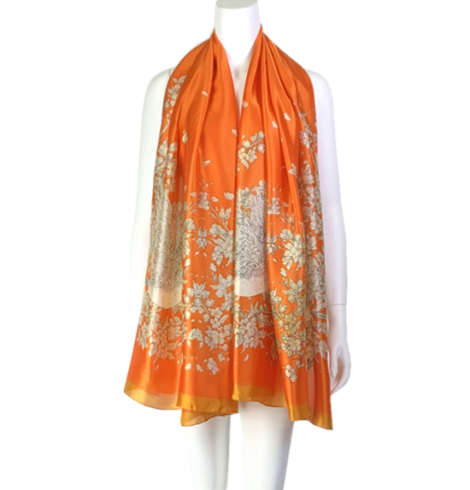 A photo of the Bliss Floral Scarf in Orange product