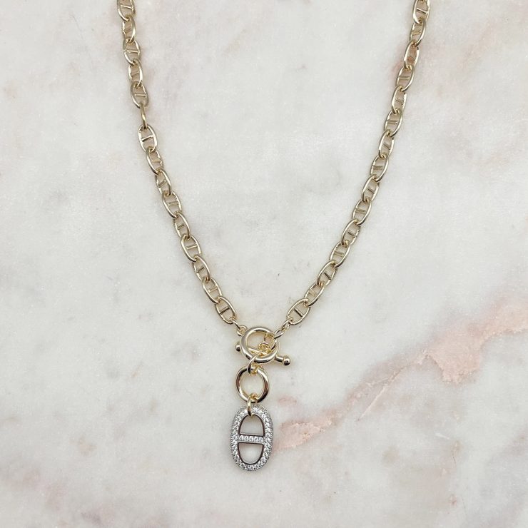 A photo of the Mila Necklace in Gold product