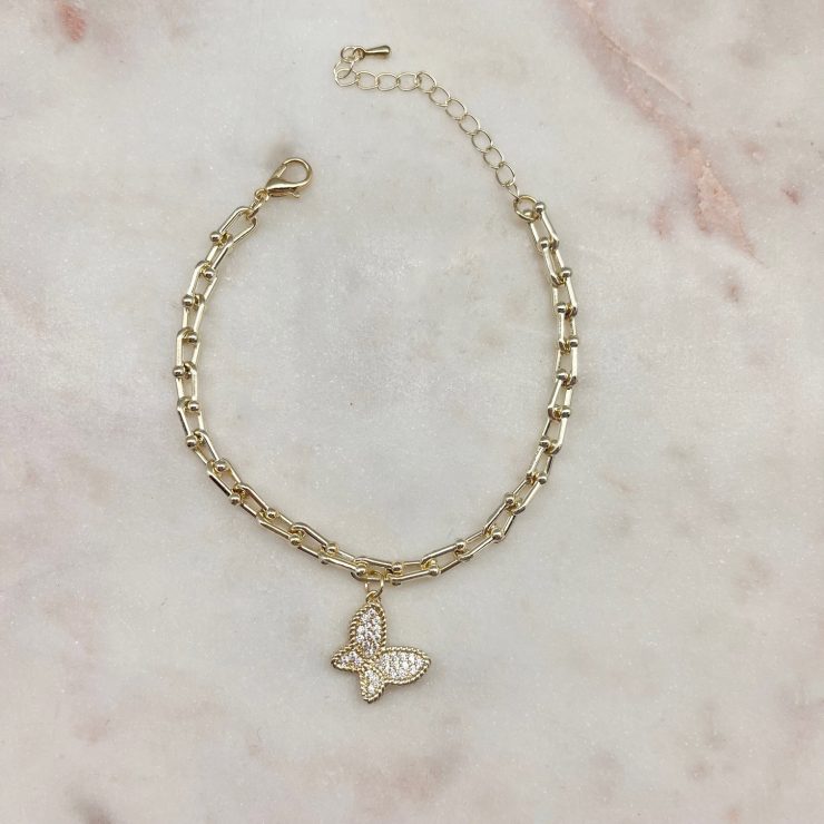 A photo of the Paperclip Butterfly Charm Bracelet product