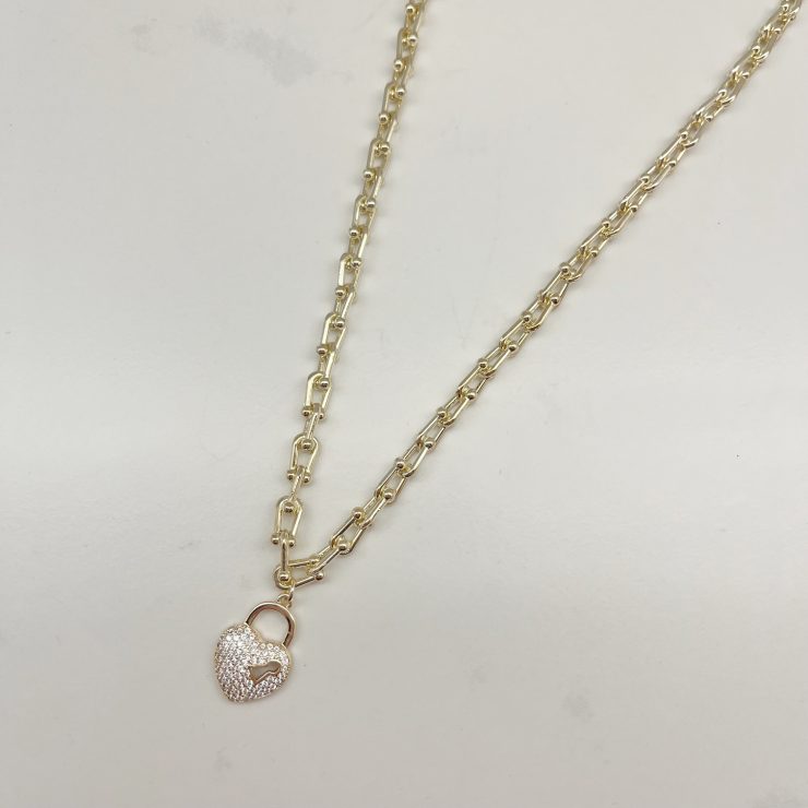 A photo of the Paperclip Locket Necklace in Gold product