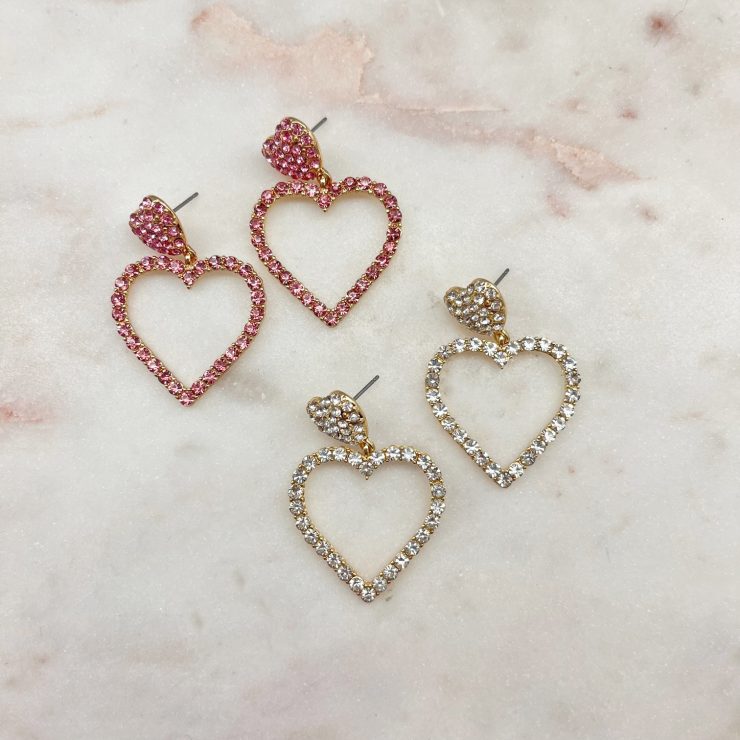 A photo of the Rhinestone Heart Drop Earrings product