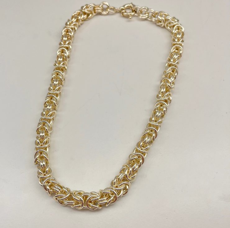 A photo of the Rosa Necklace in Gold product