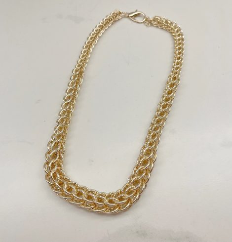 A photo of the Woven Cage Necklace in Gold product