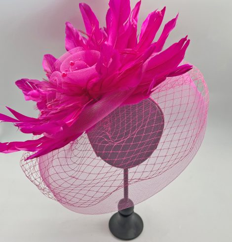 A photo of the Frida Fascinator in Hot Pink product