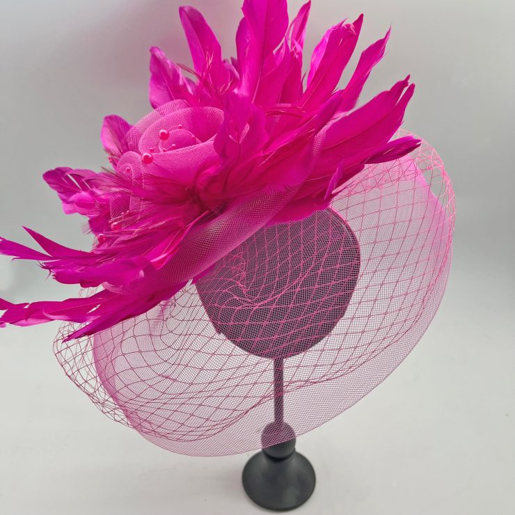 A photo of the Frida Fascinator in Hot Pink product
