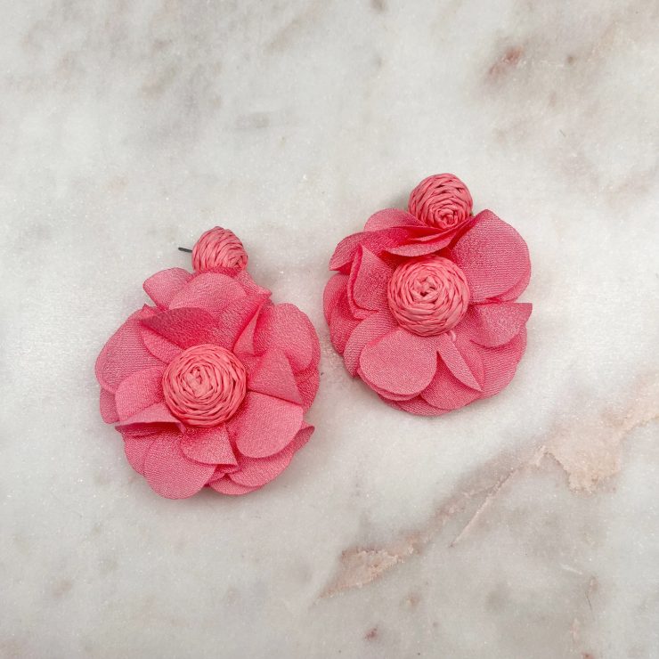 A photo of the Light Pink Flora Earrings product