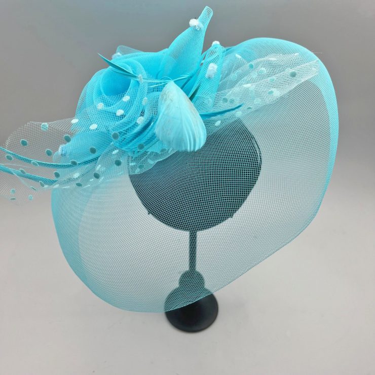 A photo of the Flora Fascinator in Neon Blue product