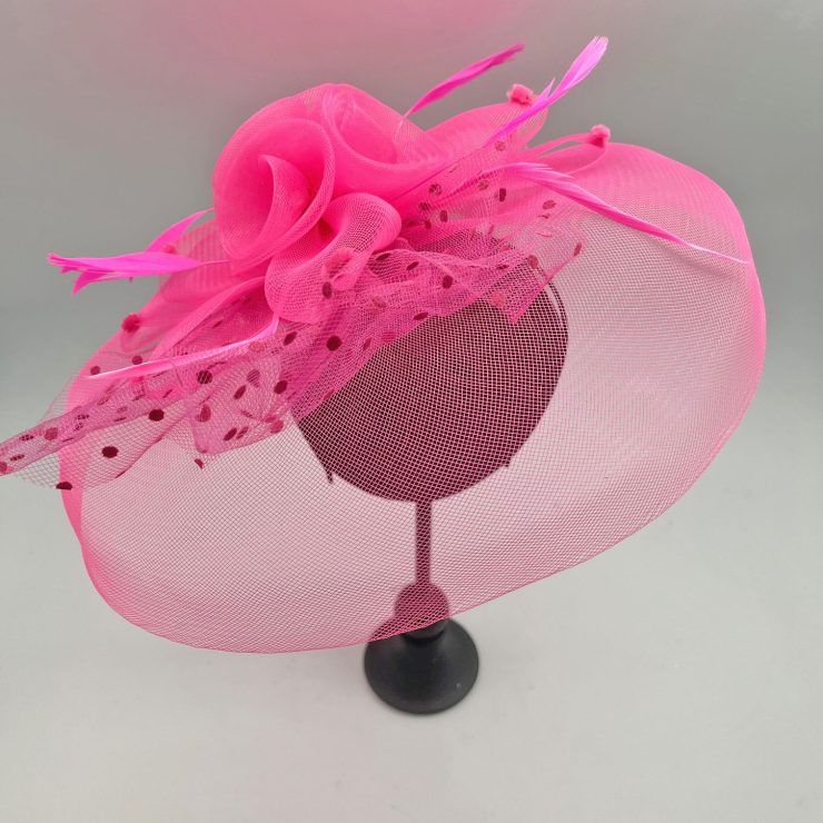A photo of the Flora Fascinator in Neon Pink product