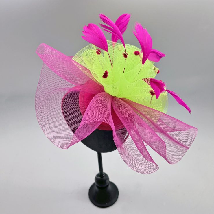 A photo of the Nita Fascinator in Pink & Green product