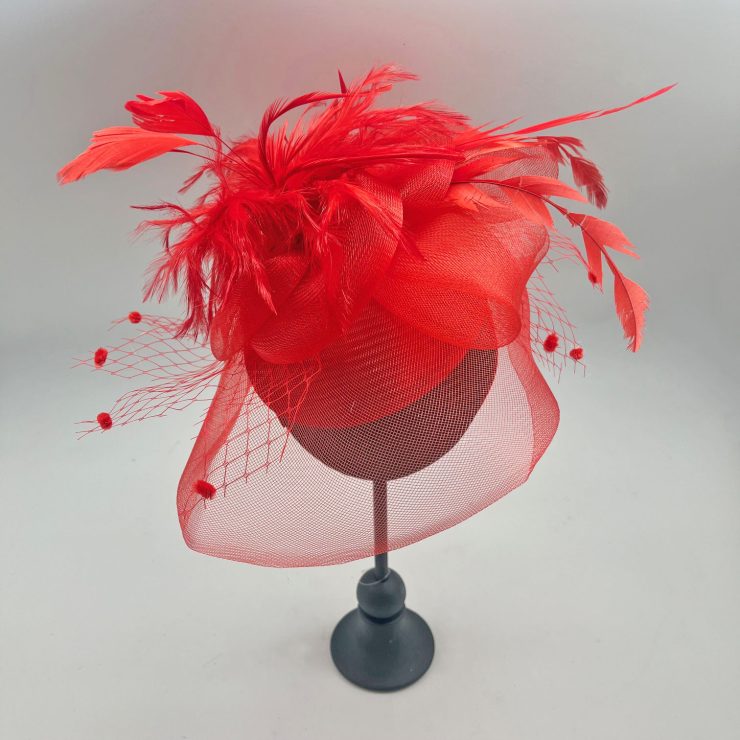 A photo of the Feather Fascinator in Red product