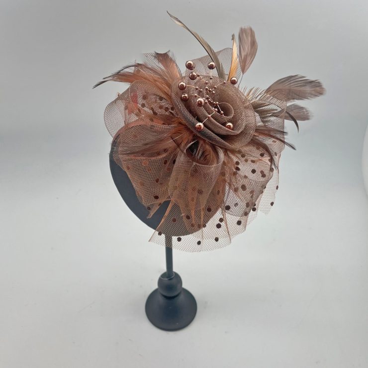 A photo of the Serena Fascinator in Brown product